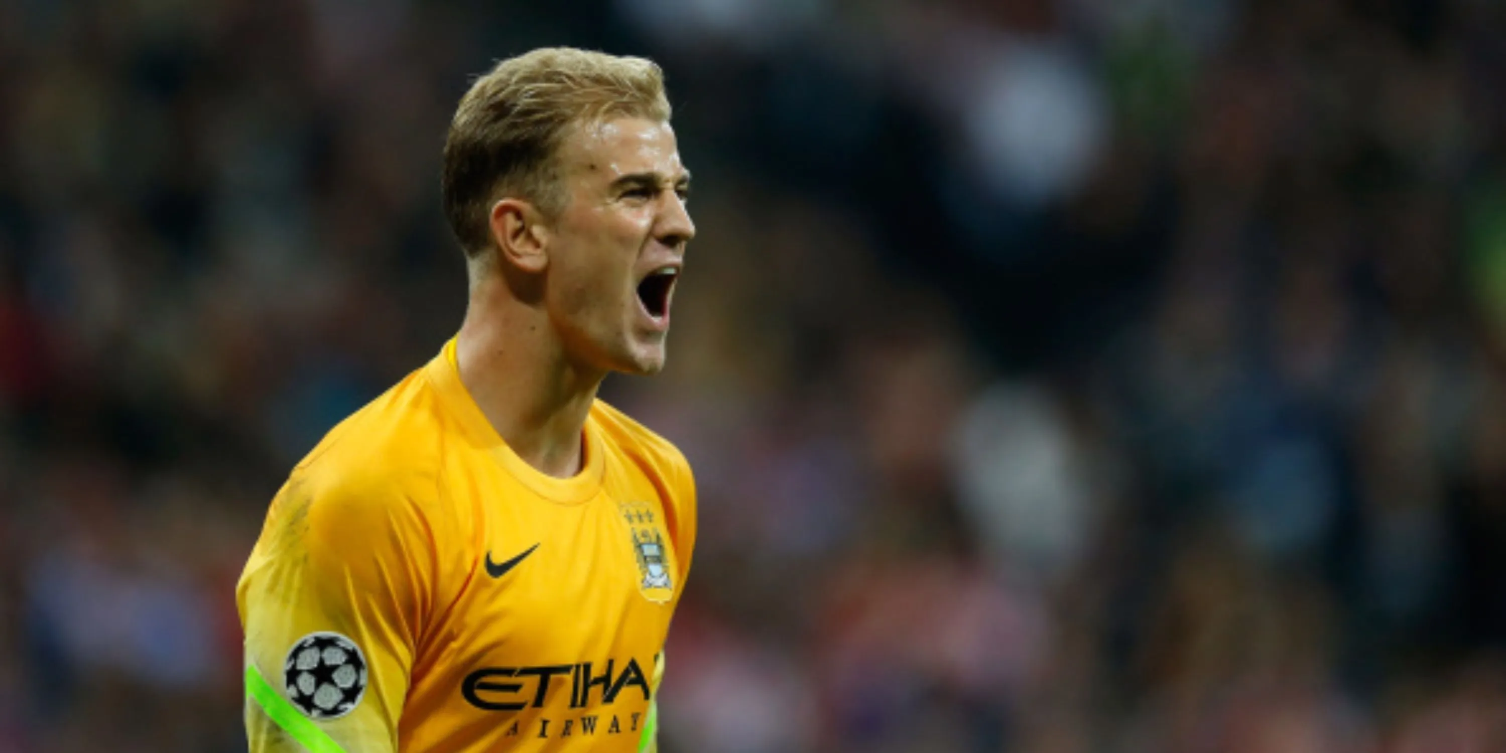 Thủ môn Joe Hart hét lên ăn mừng bàn thắng của Sergio Aguero giúp Man City vô địch Premier League 2012