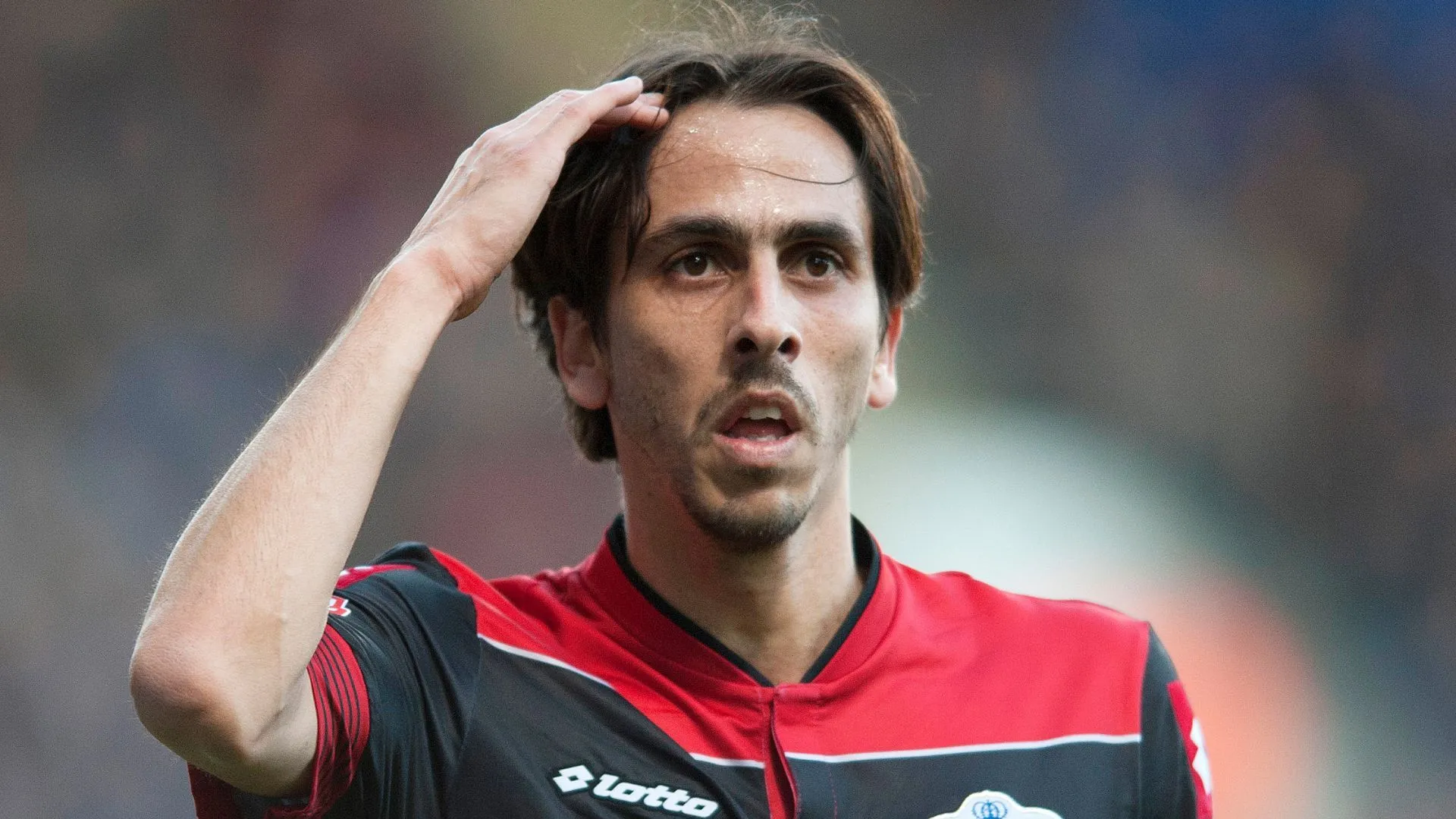 Yossi Benayoun thi đấu cho QPR tại Championship mùa giải 2013/14